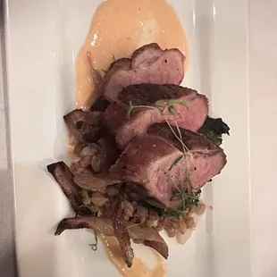 Duck Breast on faro with roasted fennel, kale, and sweet pepper rouille