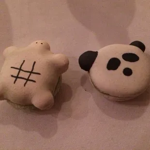 two panda bear macarons