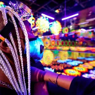 At "Wink World: Portals Into the Infinite", guests journey through six infinity mirror rooms; each containing a distinct comb...