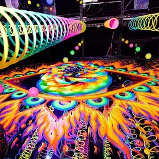 Bounce into the beyond in Wink World's infinity mirror slinky room! Spirals are in our DNA, and we will spin you right round ...