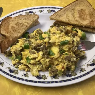 a plate of eggs and toast