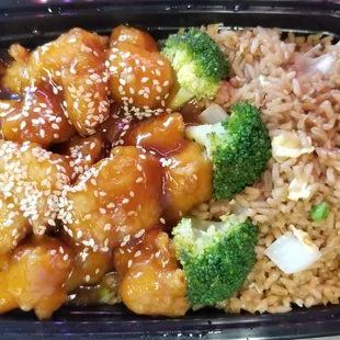 Sesame Chicken with Fried Rice and an Egg Roll.