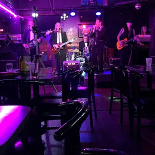 a band playing on stage