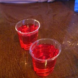 two cups of red liquid