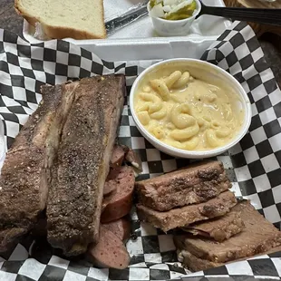 3 meat plate (Brisket, ribs, sausage) Mac and cheese and coleslaw