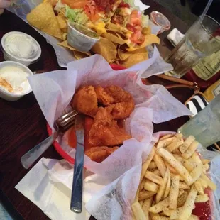 Supreme Nachos and Wibgs and fries