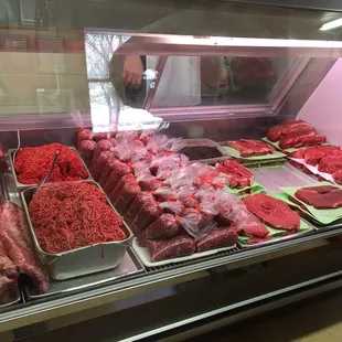 a display of raw meat