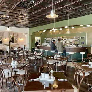 Interior with tables, and counter seating