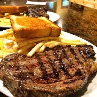 The Classic  Marinated Fillet Steak comes with Texas Toast Baked Potato and a salad bar for under $15 wow!