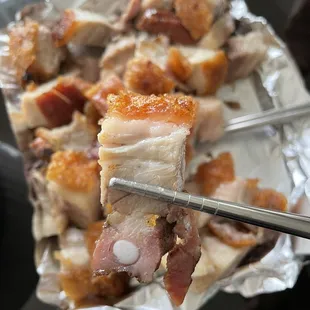 a piece of meat wrapped in foil