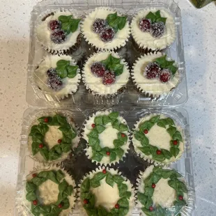a tray of christmas cupcakes