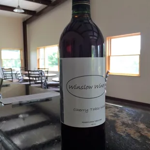 a bottle of wine on a table