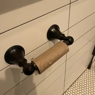 a roll of toilet paper on a roll holder