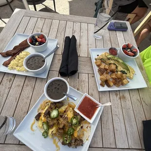Our brunch spread! The 2x2x2, breakfast tacos with ribeye (a must) and the Winslow&apos;s omelette