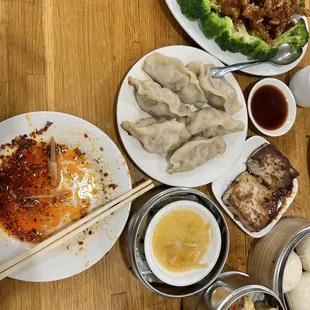 Orange chicken, pork potstickers, turnip cake, Steamed Custard Buns