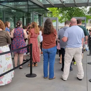 Lineup for screening and bag check before you go in