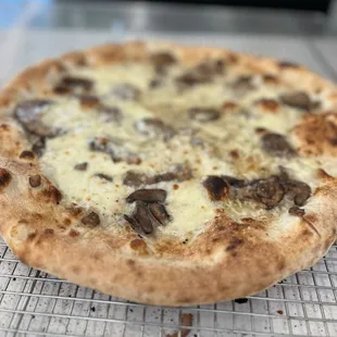 pizza on a cooling rack