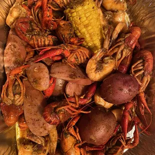 1/2lb shrimp, 1lb crawfish, corn, andouille sausage, &amp; 2 potatoes! $17.99
