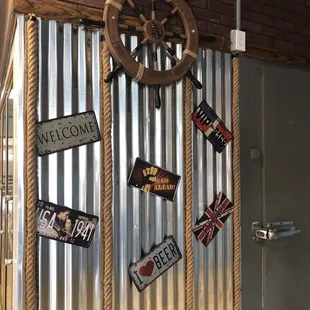 a door with a ship wheel on it