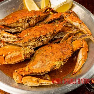 a bowl of steamed crabs