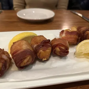 Scallops wrapped in bacon