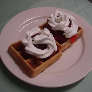 WAFFLES WITH STRWBERRY SAUCE AND WHIPPED CREAM