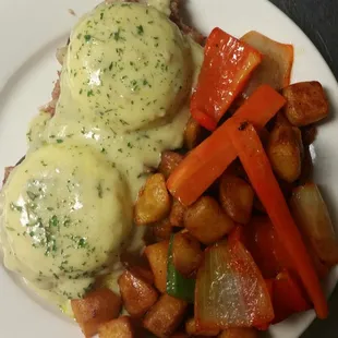 EGGS BENEDICT WITH HOME FRIES AND VEGGIES