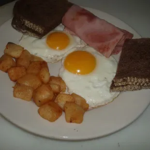 Center Cafe Special ( 2 eggs, 1 meat (bacon, sausage or ham) 1 toast bread and home fries)