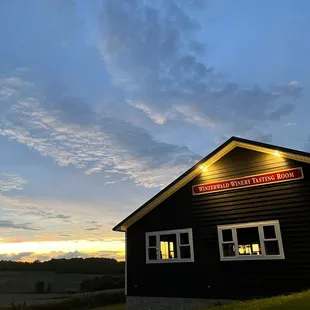 a black building at dusk