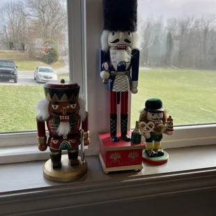 two nutcrackers on a window sill