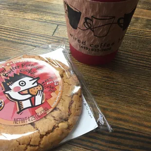 a cookie and a cup of coffee