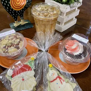 a variety of decorated cookies on a table