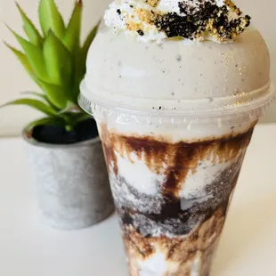 a milkshake in a plastic cup