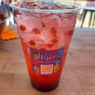 Gummy Worm loaded caffeine tea with blueberry boba