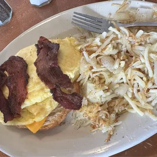 Bacon, Egg and Cheese Croissant w/hashbrowns
