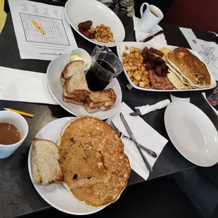 a table full of breakfast foods
