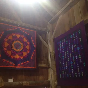 Quilts in barn