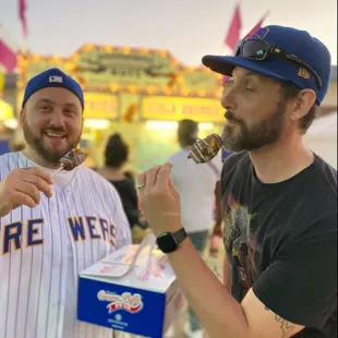 Me and my bro eating s'mores on a stick!