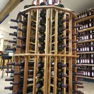 a wine rack full of wine bottles