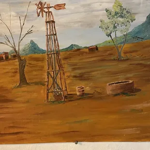 a painting of a windmill in a field