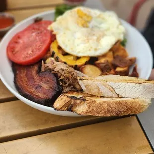 Farm breakfast with Carnitas and a side of bacon