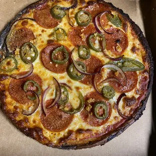 Well done pepperoni, jalapeño, onion