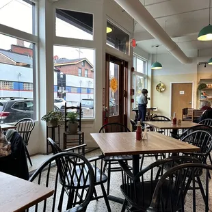 a restaurant with tables and chairs