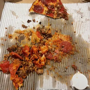 Seriously?!?! You need to fix this. Get some better kitchen equipment to actually cut your pizzas