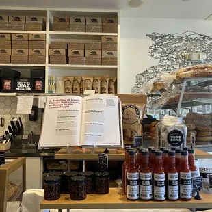shelves of food and a menu