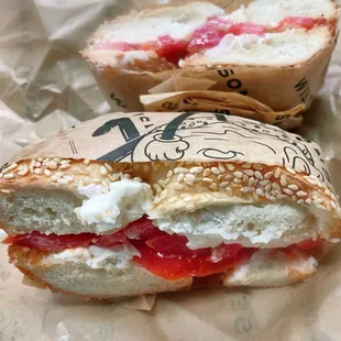 Sesame Bagel with cream cheese and tomato. The bagel is not that good. Sad.