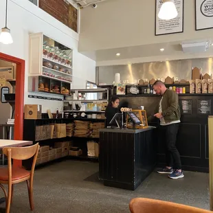 a man and a woman in the kitchen