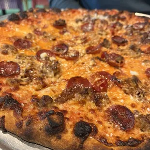 a pepperoni and cheese pizza