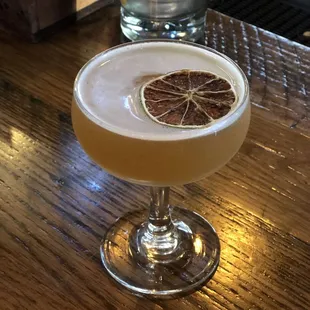 a cocktail in a coupe glass