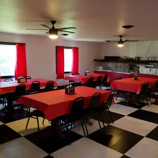 a dining room with a checkered floor